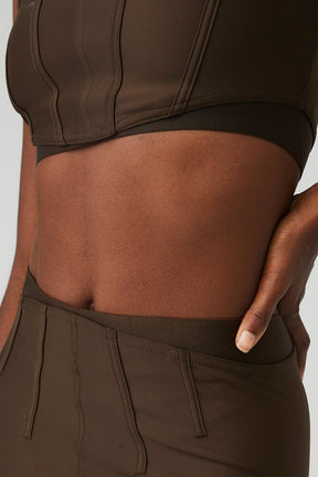 Close-up view of Airlift High-Waist 7/8 Corset Legging showing elastic details and structured corset design.