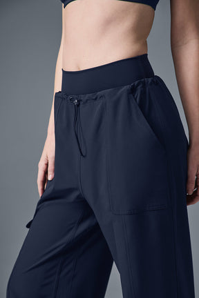 Megastar Cargo Pant close-up showing adjustable bungee waist and pockets in a stylish modern fit.