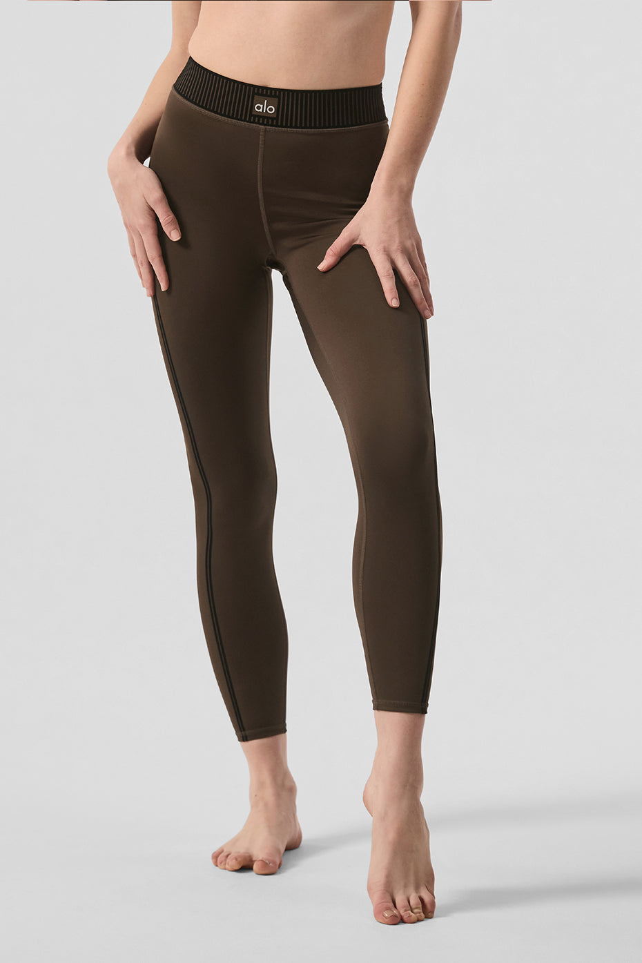 Airlift High-Waist 7/8 Line Up Legging in brown, featuring flexible fabric and a stylish design for studio and street wear.
