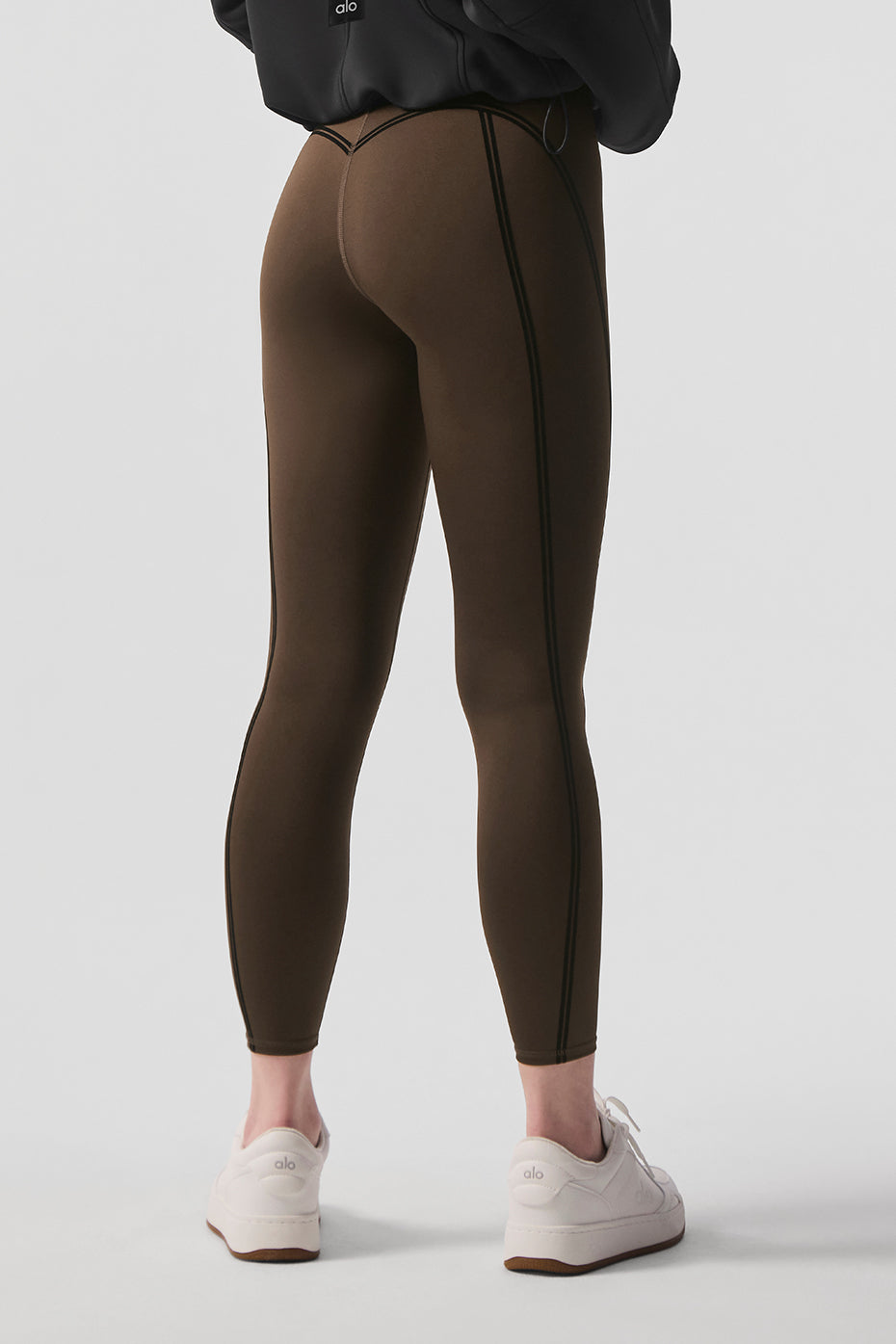 Airlift High-Waist 7/8 Line Up Legging in brown with sleek flocking detail, perfect for studio or street style.