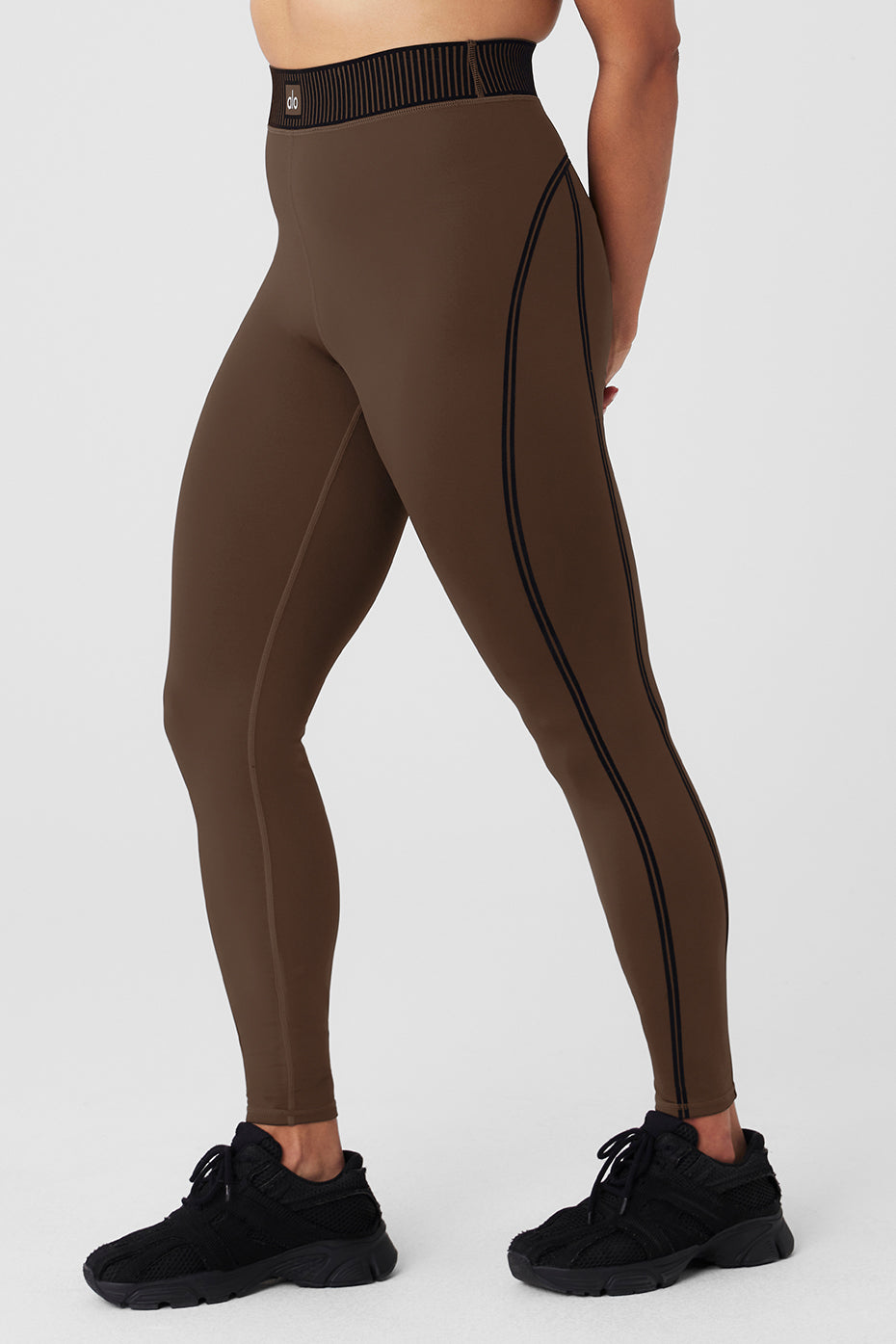 Airlift High-Waist 7/8 Line Up Legging in brown, featuring flocking details and a stylish high waistband for versatile wear.