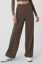 High-waist pursuit trousers with a relaxed wide-leg fit and classic details, perfect for work to weekend transitions.