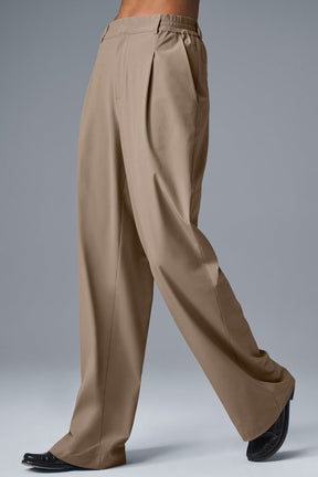 High-waist pursuit trouser long in a relaxed, wide-leg fit with tailored details and comfortable stretch-infused fabric.