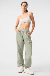 Mixed Media Reinvention Jogger in soft fabric with relaxed fit and contrasting panels, paired with a crop top.