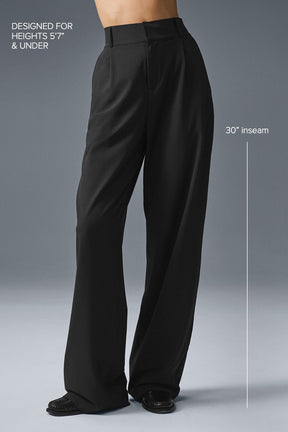 High-waist trouser designed for heights 5'7" and under, featuring a 30 inch inseam and classic pleated silhouette.