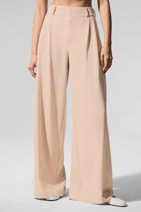 High-Waist Dreamscape Trouser in lightweight crinkle fabric with pleated silhouette, perfect for stylish layering.
