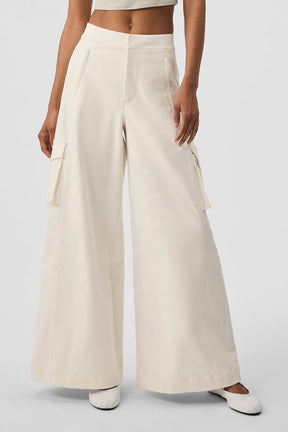 Show Off Cargo Wide Leg Trouser in cream featuring exaggerated wide legs and cargo pockets for a stylish, comfortable fit.