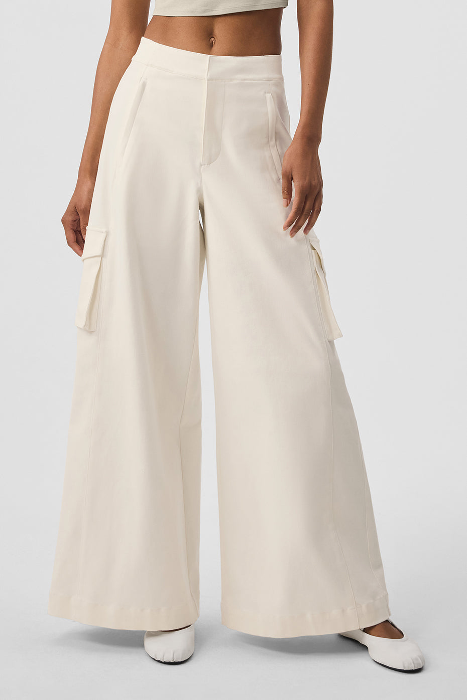 Show Off Cargo Wide Leg Trouser in cream featuring exaggerated wide legs and cargo pockets for a stylish, comfortable fit.