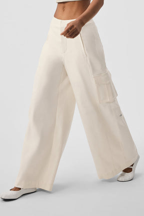 Show Off Cargo Wide Leg Trousers with exaggerated wide legs and cargo pockets in a lightweight cotton blend