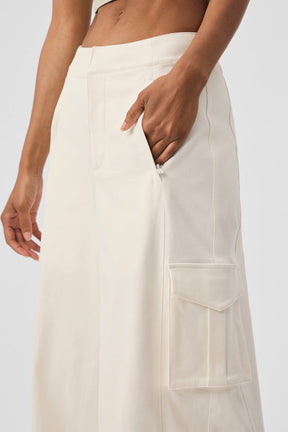Close-up of a model wearing Show Off Cargo Wide Leg Trouser with side cargo pocket in drapey cotton blend fabric.