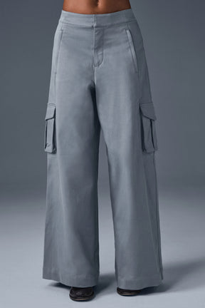 Show Off Cargo Wide Leg Trouser in grey with exaggerated wide legs and cargo pockets for a stylish look.