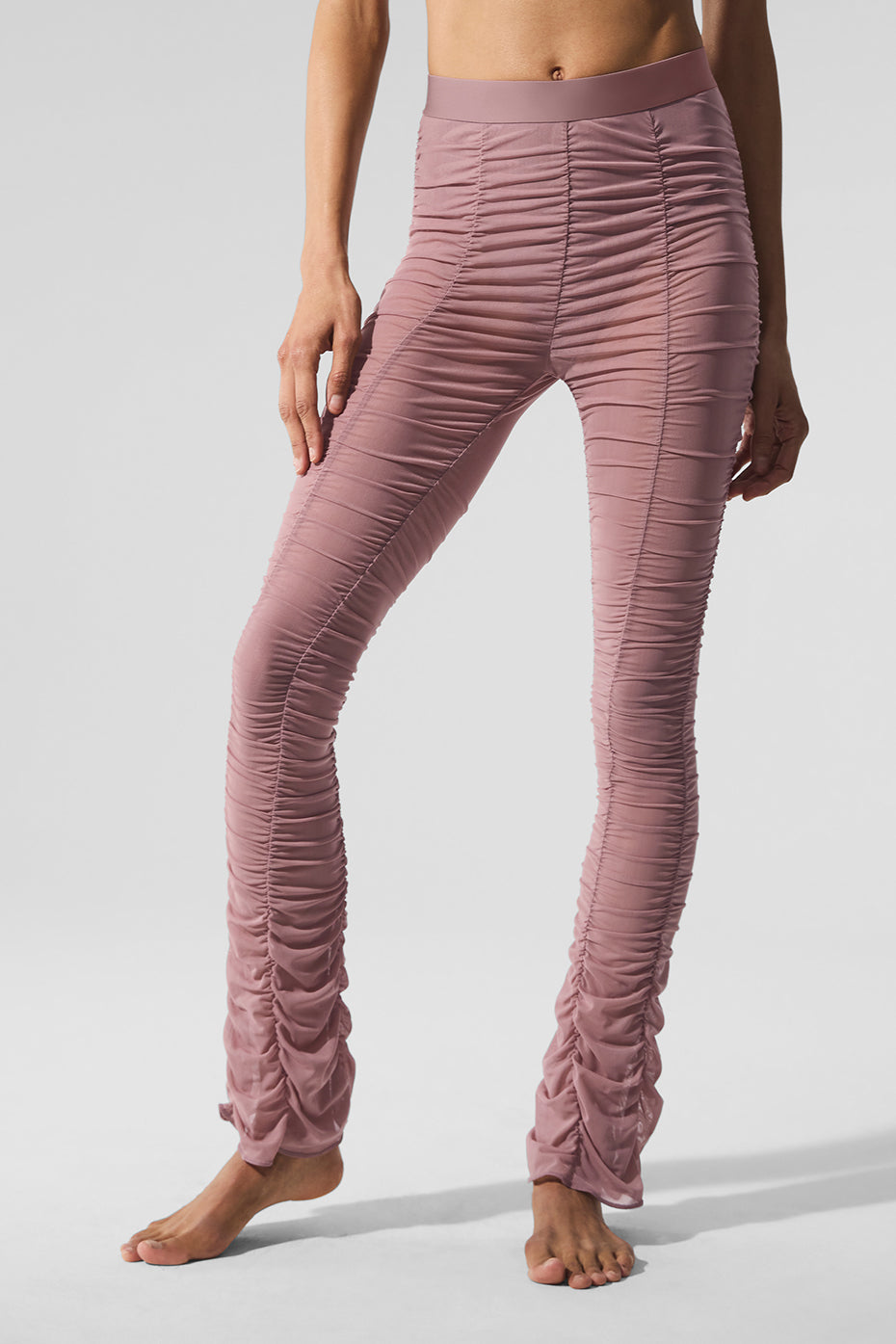 Airlift Mesh High-Waist Cherish Legging in pink with flared legs and ruched detailing, perfect for workout and casual wear.
