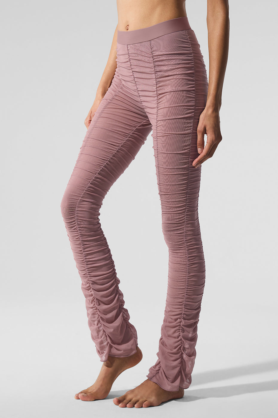 Model showcasing Airlift Mesh High-Waist Cherish Legging in ruched design, perfect for stylish workouts.