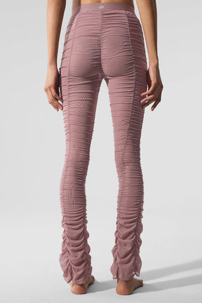 Airlift Mesh High-Waist Cherish Legging in pink with a flared leg and ruched design, showcasing a stylish back view.