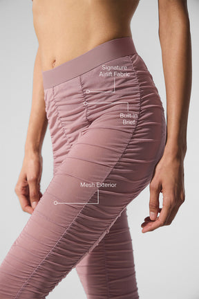 Close-up of Airlift Mesh High-Waist Cherish Legging highlighting signature fabric, built-in brief, and mesh exterior details.