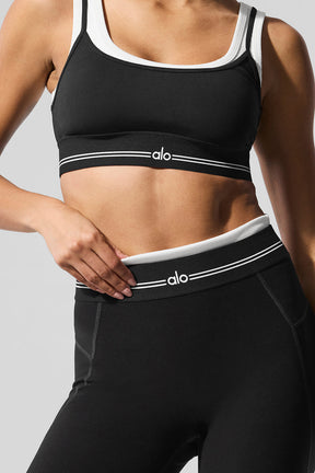Model wearing Airbrush Better Together Bra and High-Waist Better Together Legging showing elastic logo waistband.