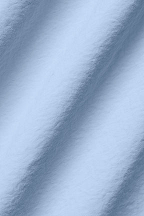Lightweight sport-ready woven fabric in soft blue for comfortable outdoor activities and stylish shorts
