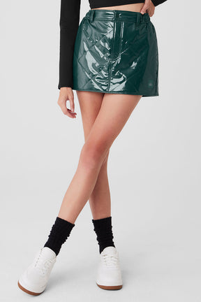 Snomoto Puffer Mini Skirt in high-shine green fabric with quilted finish and mid-thigh length hem.
