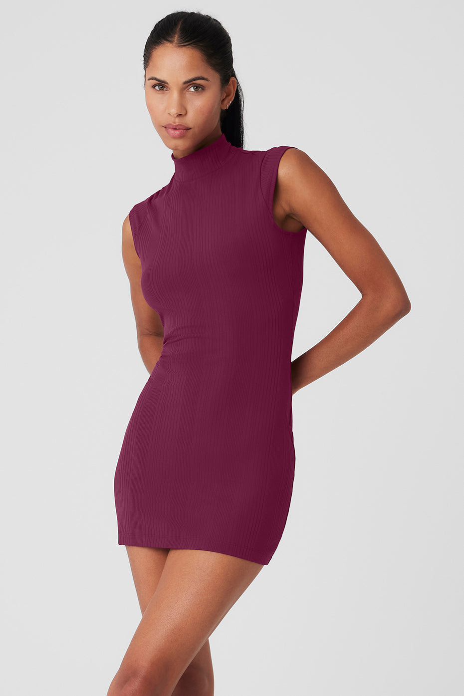 Run It Back Dress in burgundy with mock neck and sleeveless silhouette, featuring a ribbed finish for a flattering fit.