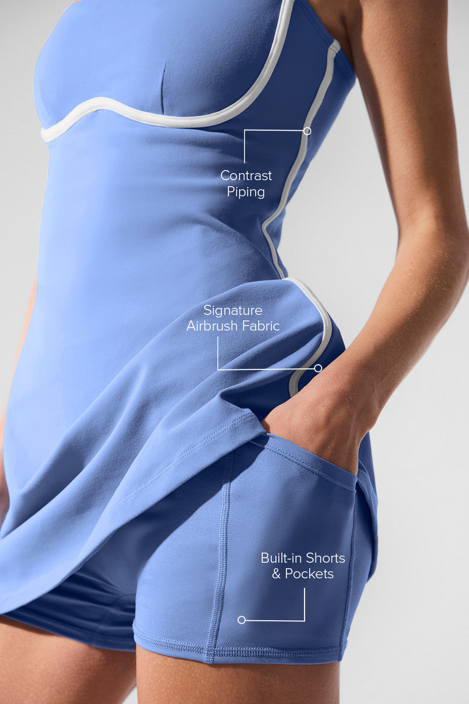 Airbrush Streamlined Dress featuring contrast piping, signature airbrush fabric, built-in shorts, and pockets.