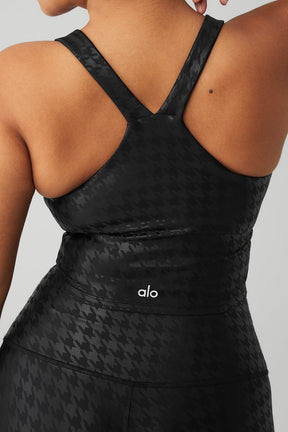 Back view of sleek Airlift Glimmer Houndstooth Real Bra Tank showcasing tonal houndstooth pattern and supportive built-in bra.