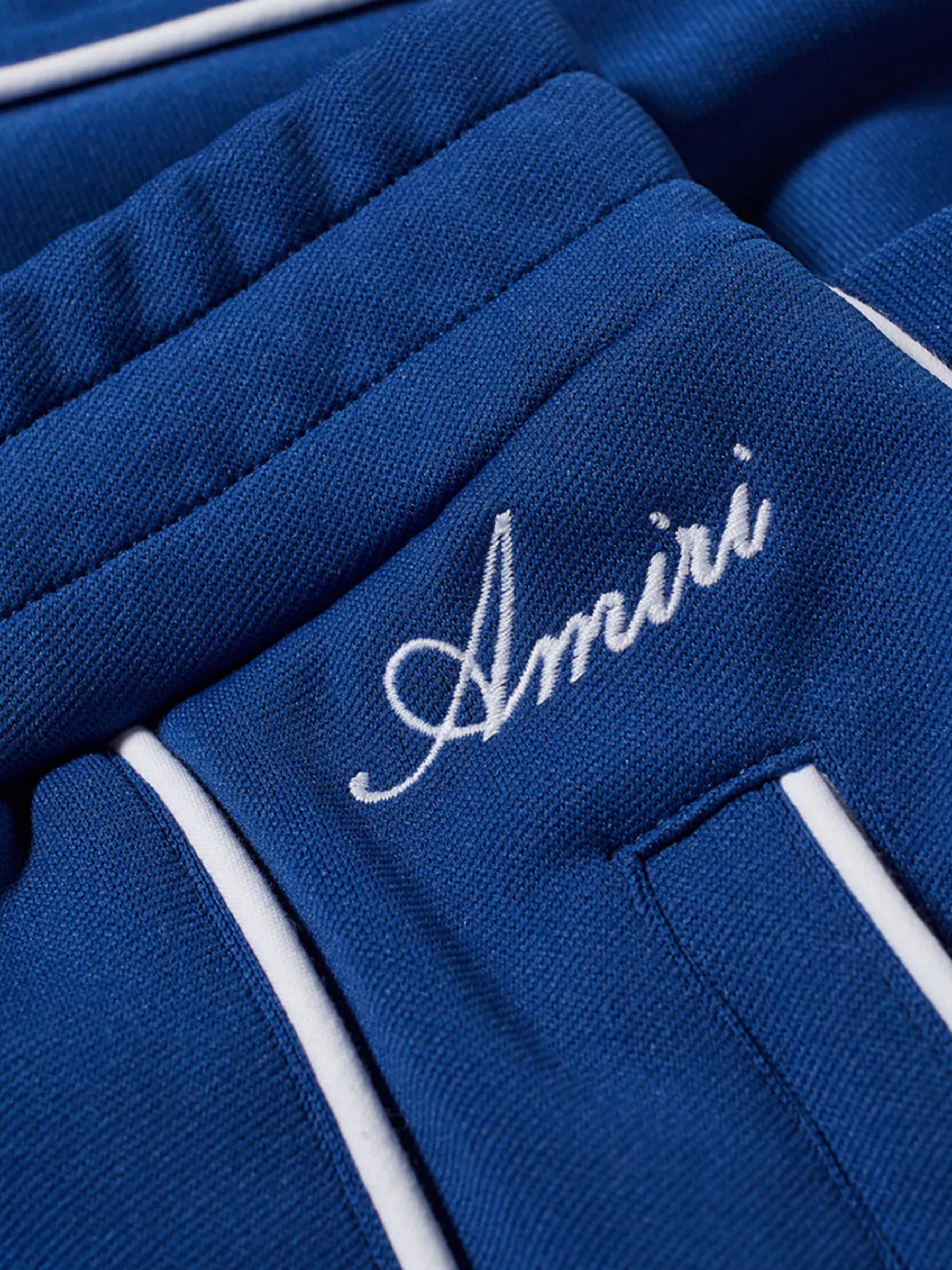 AMIRI WESTERN TRACK PANTS BLUE