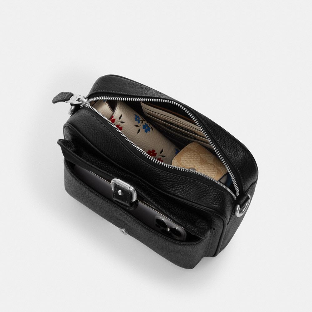 Warner Crossbody Bag In Signature Canvas