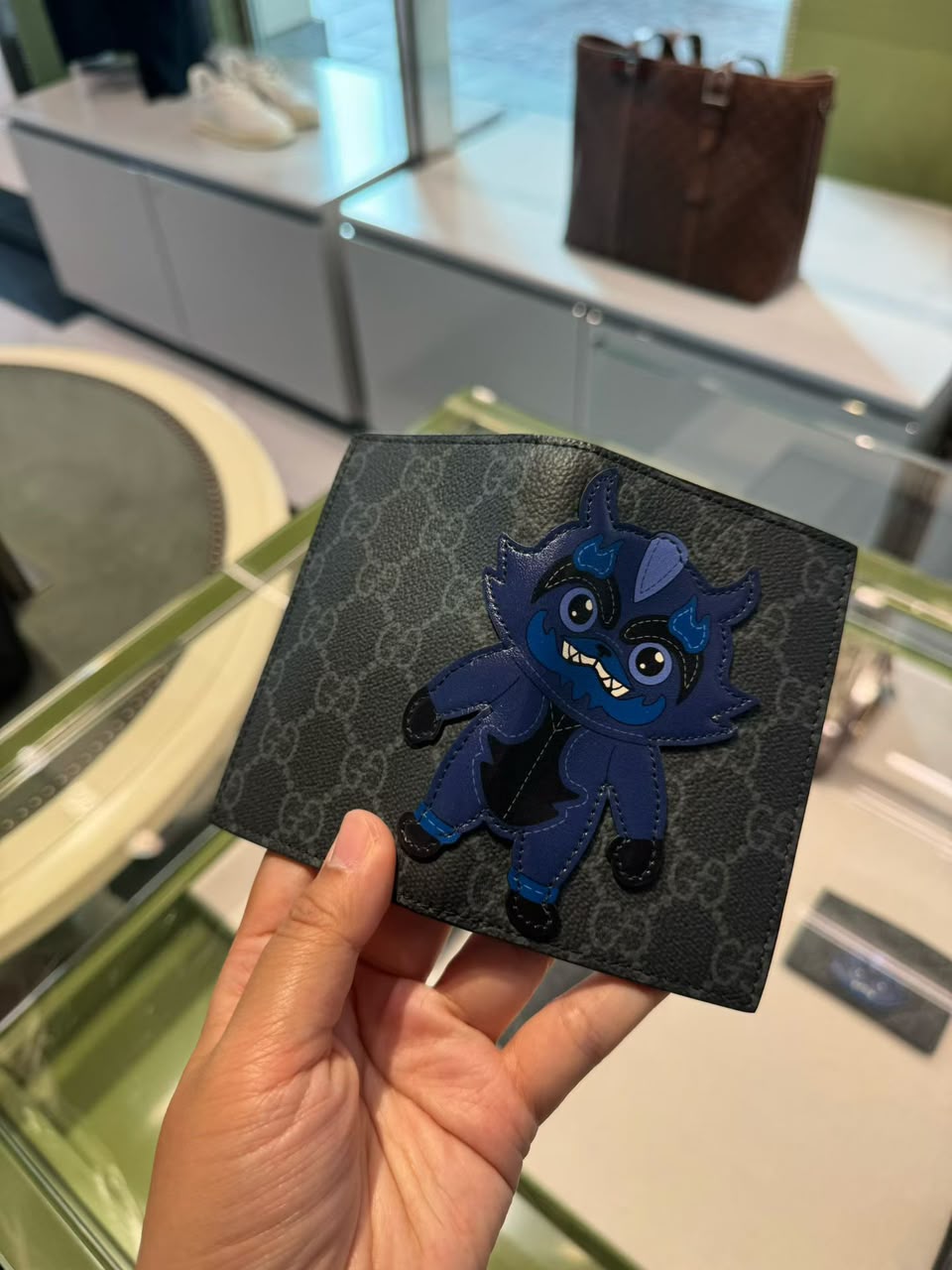 GG Supreme canvas bi-fold wallet