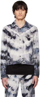 AMIRI black cracked tie-dye denim jacket featuring non-stretch fabric, button closure, and unique paint splatter design.