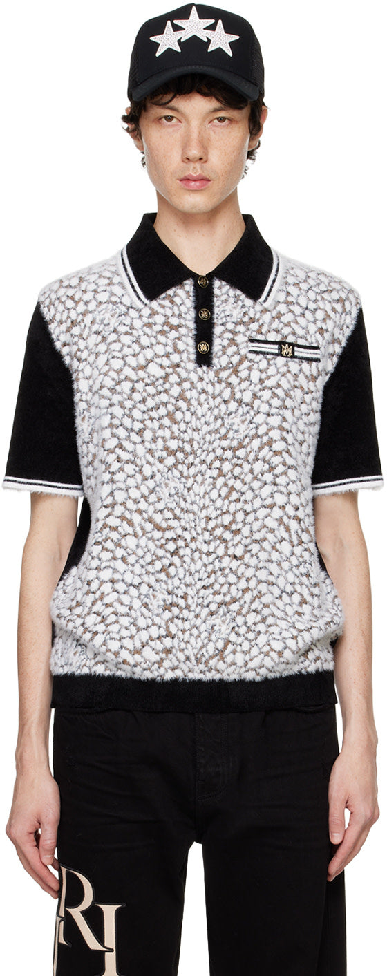 AMIRI Black M.A. Leopard Polo featuring nylon and viscose-blend knit with jacquard leopard pattern and ribbed collar.