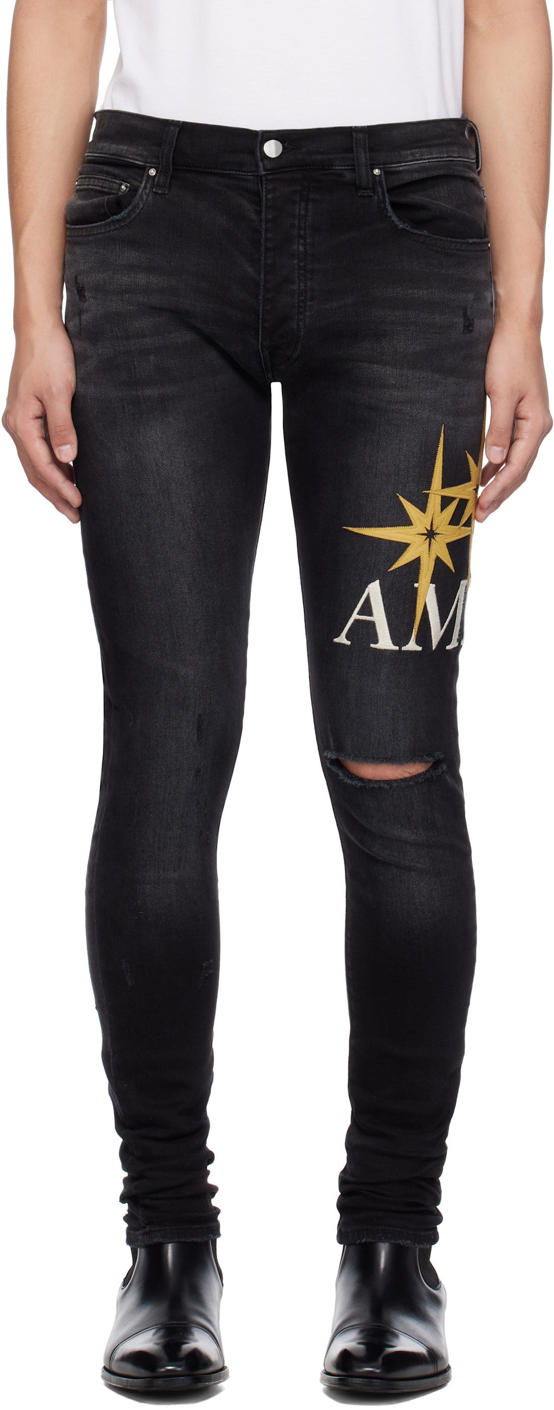 AMIRI Black Starburst Applique Skinny Jeans