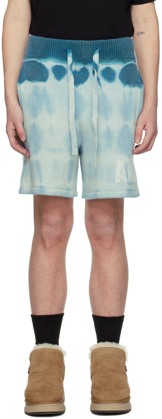 AMIRI blue tie dye cashmere shorts featuring drawstring waistband and three-pocket styling.
