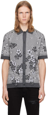 AMIRI gray bandana floral polo with spread collar and jacquard logo pattern, rib knit hem and cuffs, made in Italy.