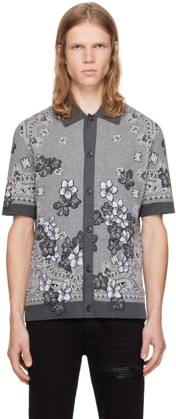 AMIRI gray bandana floral polo with spread collar and jacquard logo pattern, rib knit hem and cuffs, made in Italy.