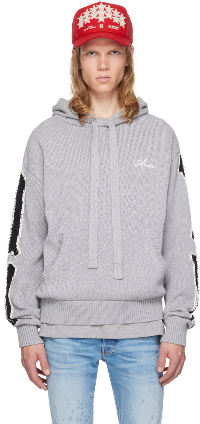 AMIRI gray bones hoodie with drawstring hood, kangaroo pocket, and intarsia graphics, made in Italy
