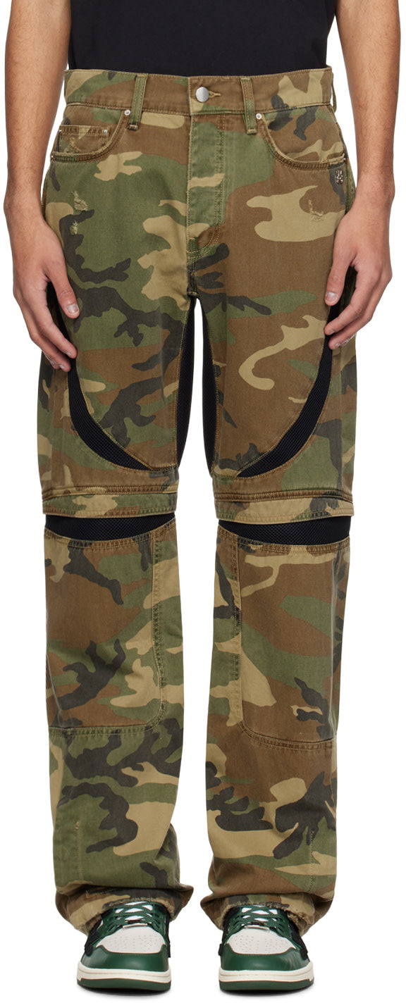 AMIRI green MX-3 trousers in camouflage pattern, featuring straight-leg design, cotton canvas, five-pocket styling, and button-fly.