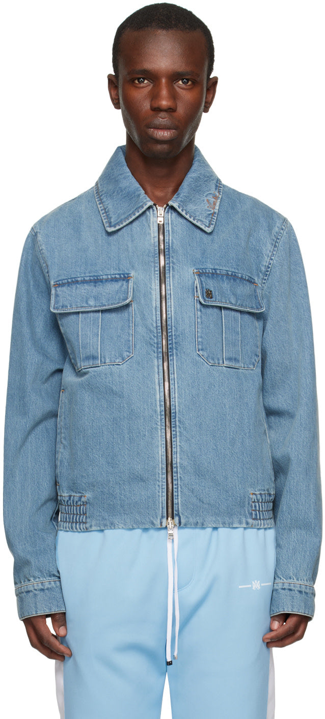 AMIRI Indigo Two-Way Zip Denim Jacket in non-stretch 14 oz denim, featuring flap pockets and contrast stitching.
