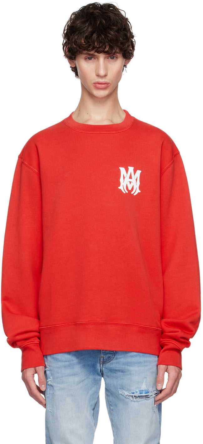 AMIRI red MA Core logo sweatshirt featuring a rib knit crewneck and dropped shoulders, made of 100% cotton.