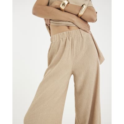 Beige Textured Wide Leg Trousers