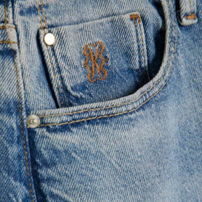 Blue High Rise Split Hem Flared Jeans