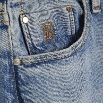 Blue High Rise Split Hem Flared Jeans