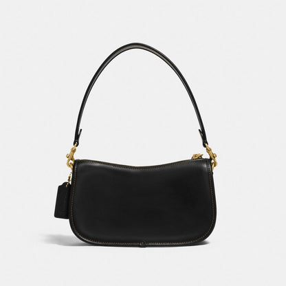 Disney X Coach Swinger Bag In Regenerative Leather With Mickey Mouse And Friends