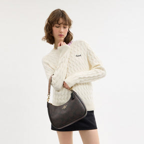 Teri Hobo Bag In Blocked Signature Canvas
