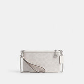 Pouch Bag In Signature Canvas