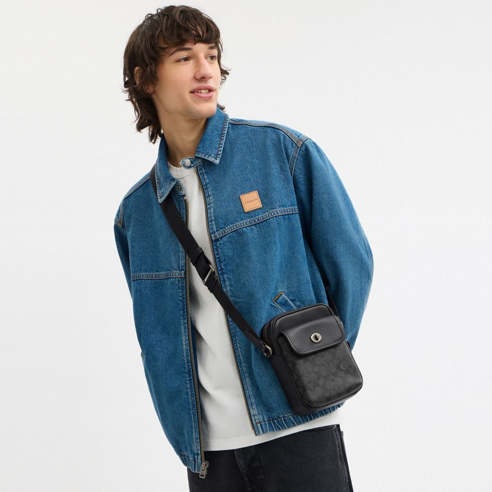 Turnlock Crossbody Bag In Signature Canvas