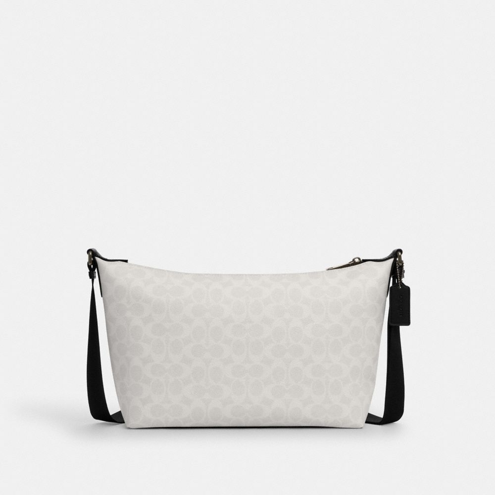 Finn Crossbody Bag In Signature Canvas