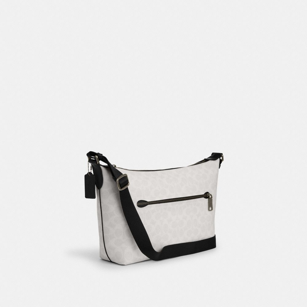 Finn Crossbody Bag In Signature Canvas