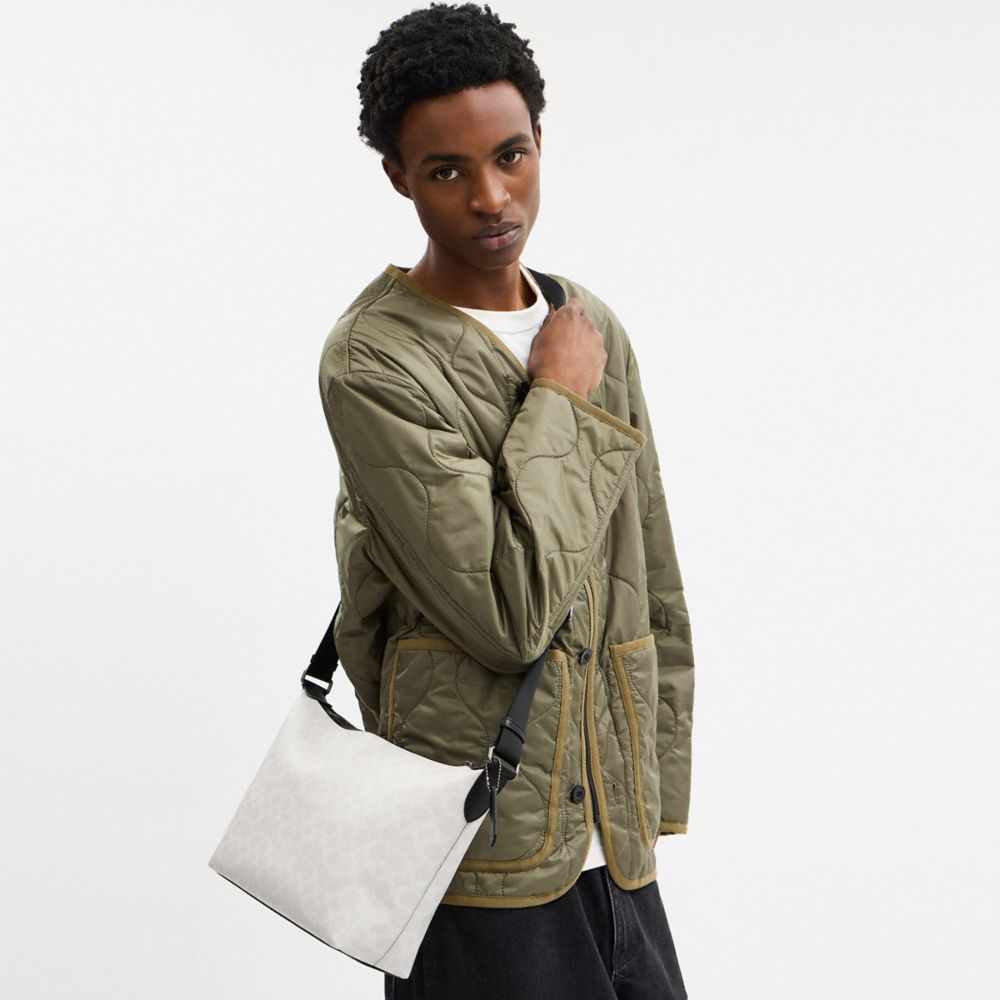 Finn Crossbody Bag In Signature Canvas