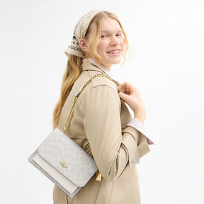 Klare Crossbody Bag In Signature Canvas