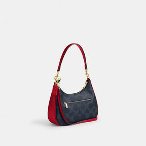 Teri Hobo Bag In Signature Canvas
